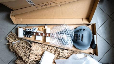 electric box guitar|cheapest way to ship guitar.